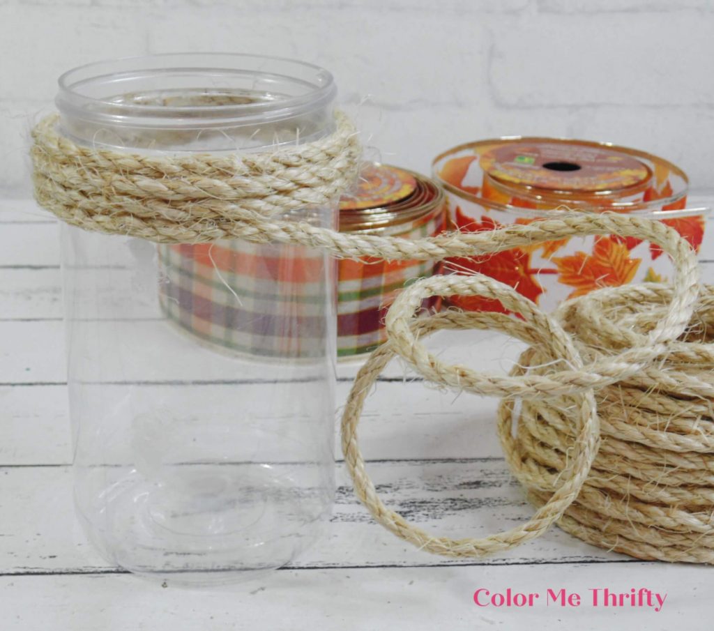 gluing sisal rope around peanut butter jar