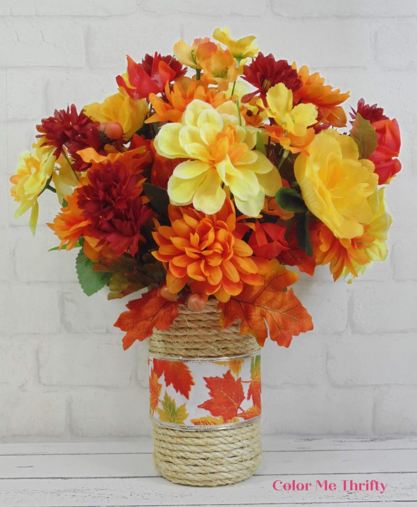 upcycled rope vase filled with fall flowers